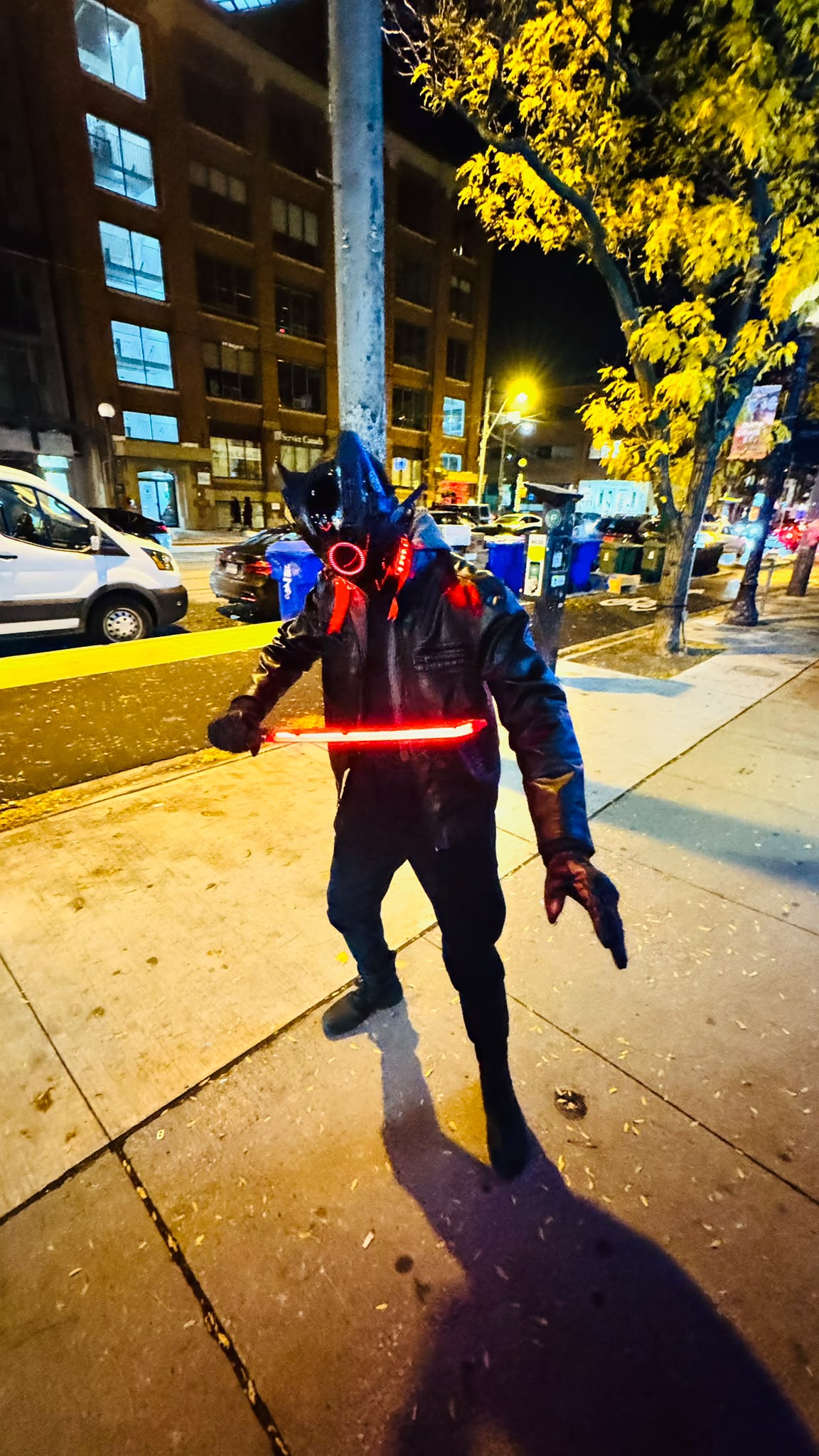 Joshua wearing an illuminated costume at night